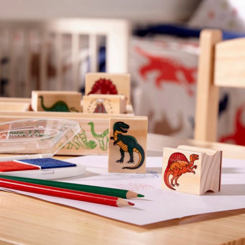 Close-up of colored pencils included with Dinosaur Stamp Set
