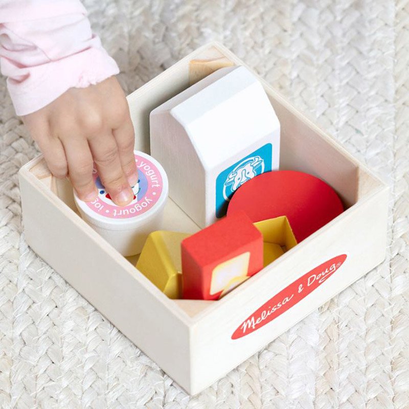 Close-up of wooden cheese and yogurt pieces from Food Groups Dairy set